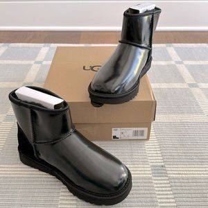 Brand new, with tags and box, never worn mini Ugg irridesent boots, size US 7